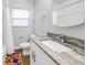 Clean bathroom with a granite vanity, and shower-tub combo at 3510 4Th N Ave, St Petersburg, FL 33713