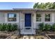 Close-up of a blue front door and stylish details of the home's exterior at 3510 4Th N Ave, St Petersburg, FL 33713