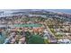 Scenic aerial view of a neighborhood with waterfront homes, private docks and beach access at 368 41St Ave, St Pete Beach, FL 33706