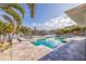 Backyard featuring a pool, spa, tropical landscaping and waterfront views from the property at 368 41St Ave, St Pete Beach, FL 33706