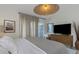 Cozy bedroom with natural light, contemporary decor, and inviting textiles at 375 Madeira Cir, St Petersburg, FL 33715