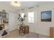 Bright room featuring white curtains, closet, and light wood floor at 375 Madeira Cir, St Petersburg, FL 33715