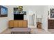 Bright living room boasts a modern entertainment center and stylish decor for comfortable living at 375 Madeira Cir, St Petersburg, FL 33715
