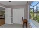 Bedroom featuring natural light from a large window and closet, and neutral walls at 403 Saint Petersburg W Dr, Oldsmar, FL 34677