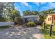Charming property with a well-maintained yard and convenient driveway, blending comfort and accessibility at 403 Saint Petersburg W Dr, Oldsmar, FL 34677