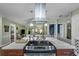 Modern kitchen with stainless appliances, island, and modern hood at 403 Saint Petersburg W Dr, Oldsmar, FL 34677