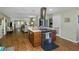 Open kitchen island with stainless steel appliances, seamlessly connecting to the living room at 403 Saint Petersburg W Dr, Oldsmar, FL 34677