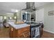 Stylish kitchen island featuring modern appliances and ample countertop space, perfect for culinary creations at 403 Saint Petersburg W Dr, Oldsmar, FL 34677