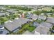 Aerial view of a home in a neighborhood with a playground and community pool at 4224 Crayford Ct, Land O Lakes, FL 34638