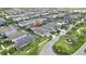 Aerial view of a well-manicured home in an attractive neighborhood at 4224 Crayford Ct, Land O Lakes, FL 34638