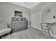 This bedroom has a Murphy bed, desk, and chair at 4224 Crayford Ct, Land O Lakes, FL 34638