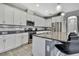 Well-equipped kitchen features granite counters, stainless steel appliances, and ample cabinet space at 4224 Crayford Ct, Land O Lakes, FL 34638
