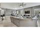 Spacious living room featuring sleek furnishings and an adjacent dining area at 4224 Crayford Ct, Land O Lakes, FL 34638