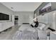 Bright main bedroom features tile floors, neutral color scheme, and a relaxing atmosphere at 4224 Crayford Ct, Land O Lakes, FL 34638
