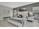 Stylish main bedroom with sleek furniture and décor, bathed in natural light at 4224 Crayford Ct, Land O Lakes, FL 34638