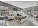 Serene main bedroom with ample natural light, stylish furnishings, and a soothing gray color palette at 4224 Crayford Ct, Land O Lakes, FL 34638