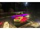 Stunning nighttime view of a custom pool and spa featuring mood lighting and a tranquil setting at 4702 Cypress Serenity Dr, Plant City, FL 33565