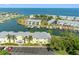Scenic aerial view of waterfront community with docks, lush landscaping, and easy ocean access at 4740 Beach Se Dr # A, St Petersburg, FL 33705