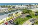 A condo building with boat docks and parking, surrounded by lush landscaping and scenic canals at 4740 Beach Se Dr # A, St Petersburg, FL 33705