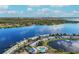 Aerial view of the waterfront Coquina Key community with a pond, community pool and views of the city at 4740 Beach Se Dr # A, St Petersburg, FL 33705