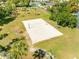 Outdoor sand volleyball court ready for play, set amidst lush landscaping and close to the waterfront at 4740 Beach Se Dr # A, St Petersburg, FL 33705