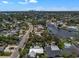 Aerial shot of property with waterfront access and lush landscaping, near the downtown skyline at 4790 Shore Acres Ne Blvd, St Petersburg, FL 33703