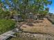 Backyard featuring mature shade trees on canal front property at 4790 Shore Acres Ne Blvd, St Petersburg, FL 33703