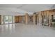 Large living room with tile floors with ample natural light and water views at 4790 Shore Acres Ne Blvd, St Petersburg, FL 33703