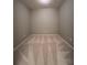 Empty bedroom with neutral carpet and paint at 5221 Bannister Park Ln, Lithia, FL 33547