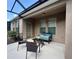 A cozy outdoor patio with seating offering a perfect spot for relaxation and conversation at 5221 Bannister Park Ln, Lithia, FL 33547