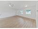 Spacious living area with light LVP flooring and ample natural light, perfect for modern living at 5772 4Th N Ave, St Petersburg, FL 33710