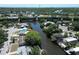 Overhead view of canal-lined homes in a serene waterfront community at 5812 Liverpool Dr, Tampa, FL 33615