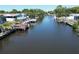 Canal view showing multiple docks on the water with homes in the background at 5812 Liverpool Dr, Tampa, FL 33615