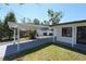 Spacious carport featuring a well-maintained driveway, and an inviting view of the home at 5812 Liverpool Dr, Tampa, FL 33615