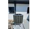 This exterior shot features an air conditioning unit with a two-window background at 5812 Liverpool Dr, Tampa, FL 33615