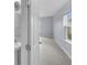 Bright bathroom featuring modern sink, stylish mirror, and light-gray flooring at 582 Royal Empress Dr, Ruskin, FL 33570