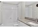 Bathroom featuring tile tub/shower, granite counters, and white cabinets at 582 Royal Empress Dr, Ruskin, FL 33570