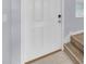 Bright entryway featuring a stylish front door and tiled flooring at 582 Royal Empress Dr, Ruskin, FL 33570
