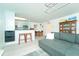 Bright living room with an open concept kitchen and living room design at 6006 Laketree Ln # K, Temple Terrace, FL 33617