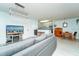 Spacious living room offers a view of the kitchen and breakfast bar at 6006 Laketree Ln # K, Temple Terrace, FL 33617