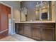 Bathroom showcasing a dual sink vanity, decorative backsplash, and modern fixtures at 7333 Royal Oak Dr, Spring Hill, FL 34607
