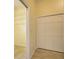 Bright bedroom features a large closet and tile flooring at 7333 Royal Oak Dr, Spring Hill, FL 34607