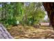 Enjoy the community exercise area with rustic wooden pull up bars and other balance features surrounded by nature at 7333 Royal Oak Dr, Spring Hill, FL 34607