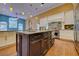 Kitchen with stainless steel appliances, granite countertops, and a center island at 7333 Royal Oak Dr, Spring Hill, FL 34607