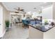 A modern open kitchen with stainless steel appliances, granite countertops and views to dining area at 742 45Th Ne Ave, St Petersburg, FL 33703