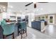 Stylish kitchen featuring granite countertops, stainless steel appliances, and a ceiling fan at 742 45Th Ne Ave, St Petersburg, FL 33703