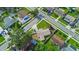 An aerial view showing the neighborhood and property lines of this suburban home at 8210 68Th N Way, Pinellas Park, FL 33781