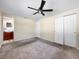 Spacious bedroom with a ceiling fan and dual closets, offering a clean aesthetic at 8210 68Th N Way, Pinellas Park, FL 33781