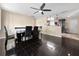 Spacious dining room with dark tile floors open to the kitchen with seating for six at 8210 68Th N Way, Pinellas Park, FL 33781