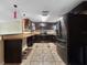 Kitchen featuring dark cabinets, stainless steel appliances, and a tile floor at 8210 68Th N Way, Pinellas Park, FL 33781